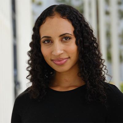 a woman posing for headshot